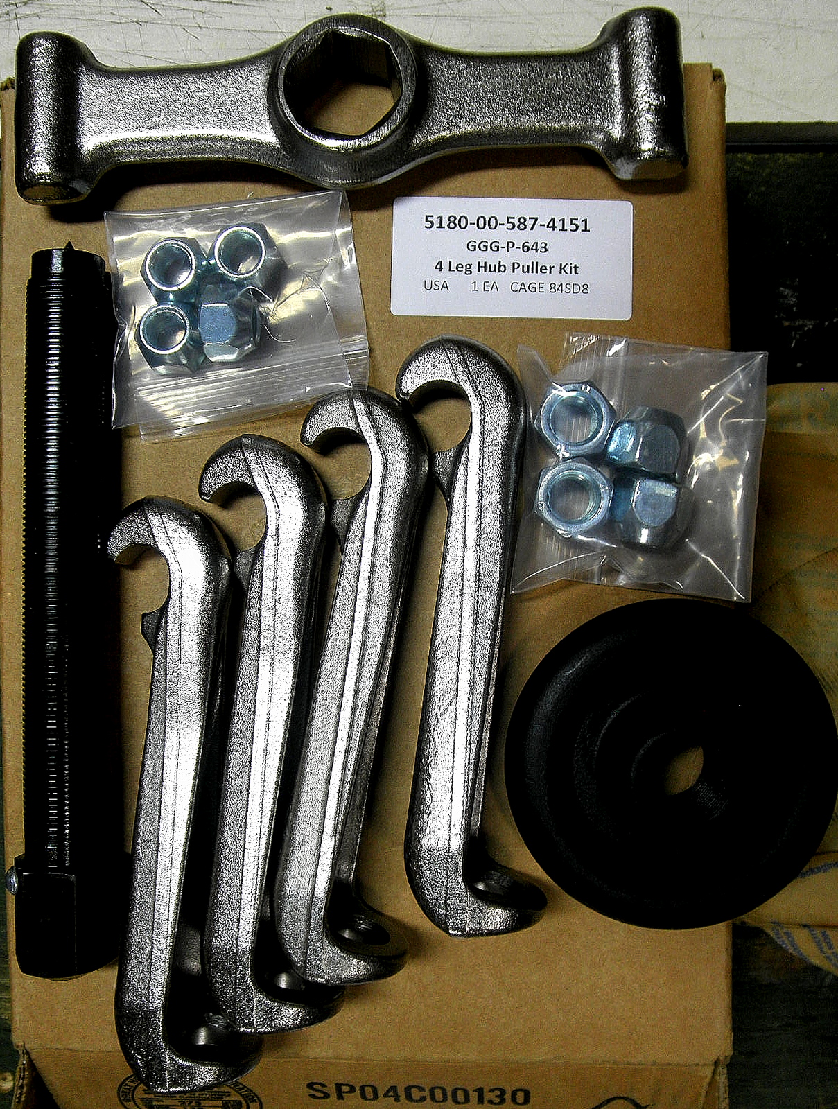 4-Leg Hub Puller Kit. This kit includes Puller hub, FOUR 6" jaws, 8 nuts, and shaft protector centering tip. Federal Specification number GGG-P-643A. NSN 5180-00-587-4151. L5B7