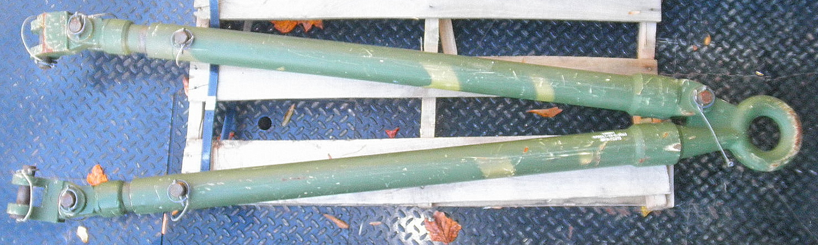 12424566 106900 4910-01-554-7296 Towbar Designed for towing the HMMWV, M39 and FMTV. ***READ*** Light scratches are present, Clevis pins have light oxidation. Lynch pins have wear. Lanyards may be broken or missing. Does not include optional Clamp assembly p/n 7551068. We can have these remanufactured at additional expense. 4-6 week lead time on remanufacture. Unassigned.